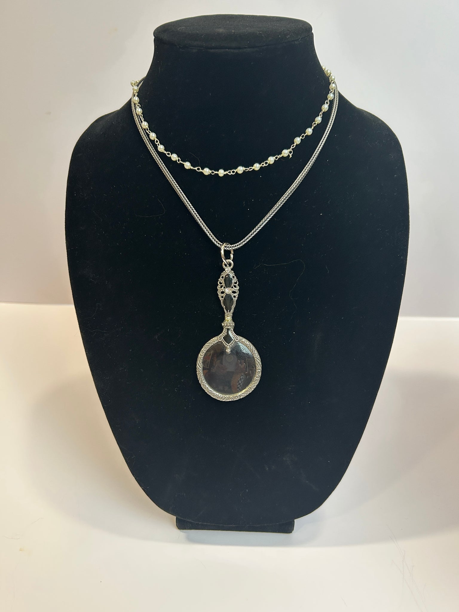 Vintage monocle on silver chain