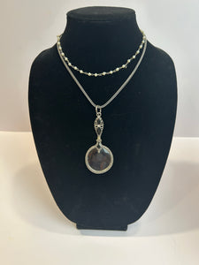 Vintage monocle on silver chain